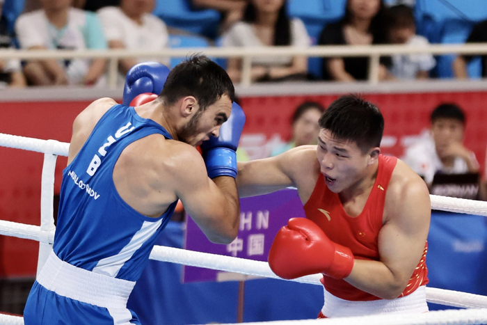 爱游戏娱乐-惊天逆转！拳击战队挺进四强